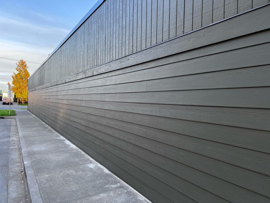 Commercial exterior painting gray siding victoria by Rebirth Painting Ltd. in Victoria, BC