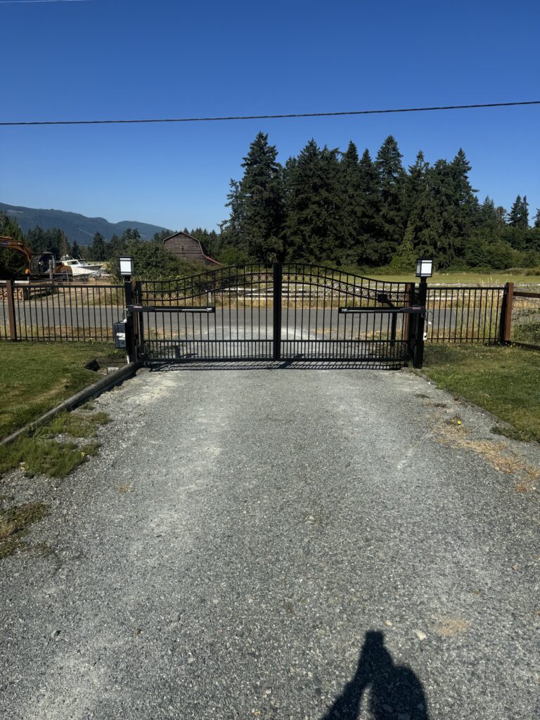 Entrance gate painting gravel driveway victoria by Rebirth Painting Ltd. in Victoria, BC