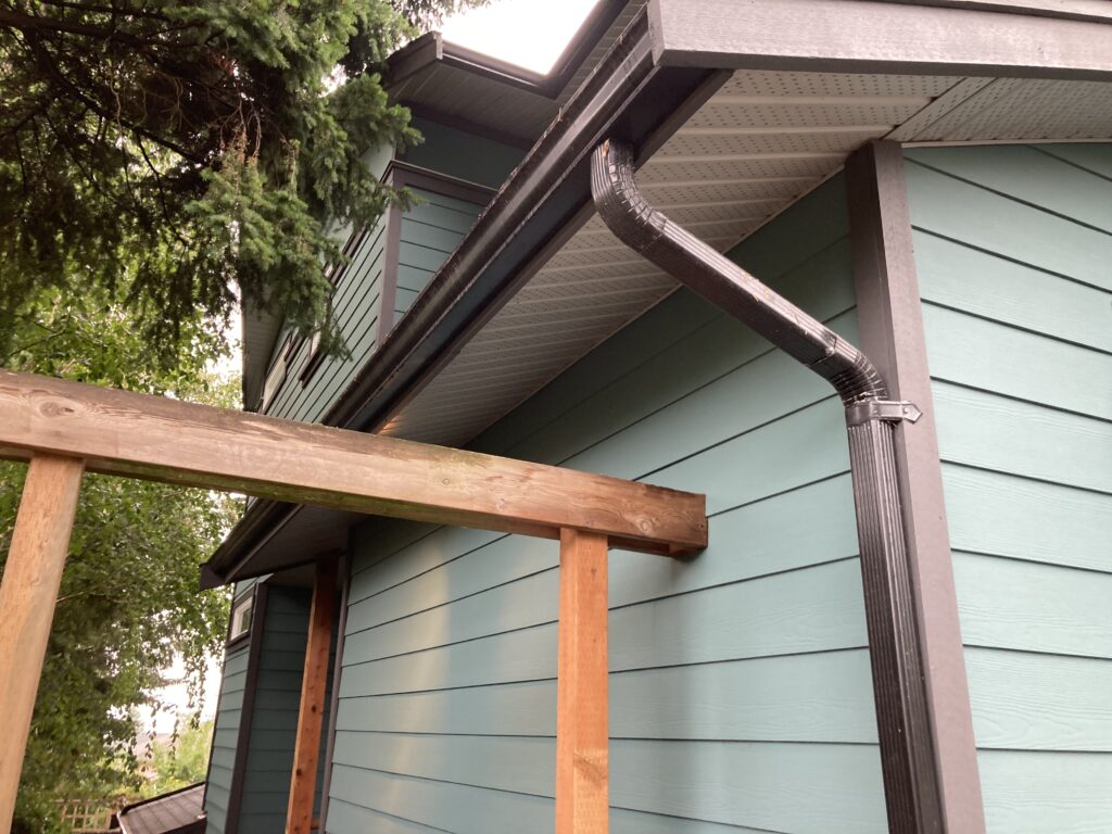 Exterior eaves painting copper gutters victoria by Rebirth Painting Ltd. in Victoria, BC