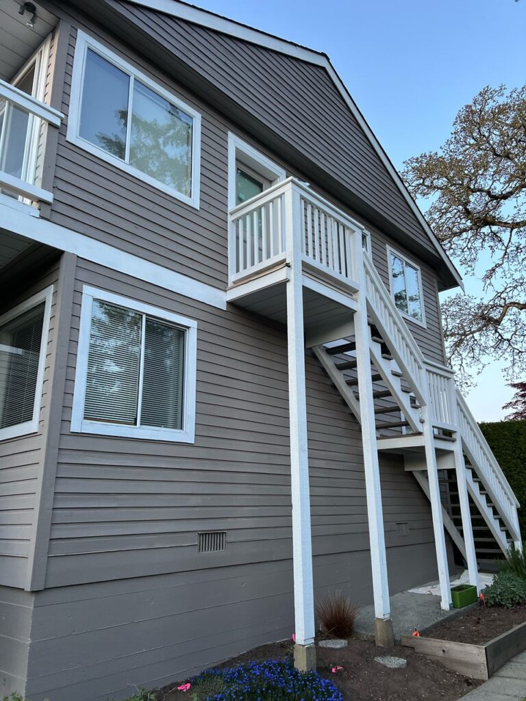 House exterior painting white staircase victoria bc by Rebirth Painting Ltd. in Victoria, BC
