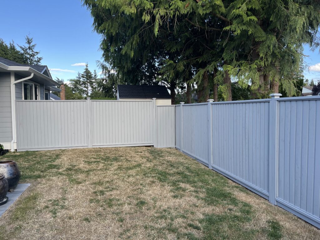 Ranch house exterior painting orange door victoria by Rebirth Painting Ltd. in Victoria, BC